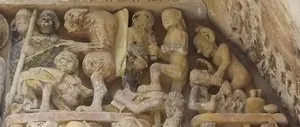 Conques : tympan de l'abbatiale, l'Enfer avec le faux monnayeur et les mauvais moines